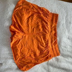 Balance Athletica (Vitality) thong lined orange running shirt